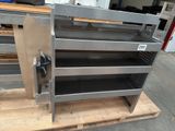 an image of a metal shelf with several shelves on it