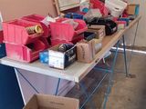 a table with a lot of boxes and other items on it