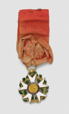 an image of a gold medal with a star on it