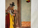 a hand holding a small card with a picture of a woman
