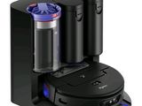 an image of a coffee maker with two cups on it