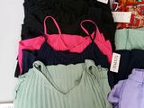 a lot of women ' s underwear on display on a table