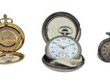 three different types of pocket watches in this picture