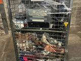 a metal cart with a bunch of items in it