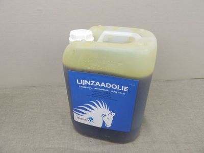 a gallon of liquid sitting on a table