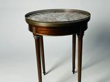 a small table with a marble top on a white background