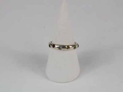 a close up of a white cone with a ring on top of it