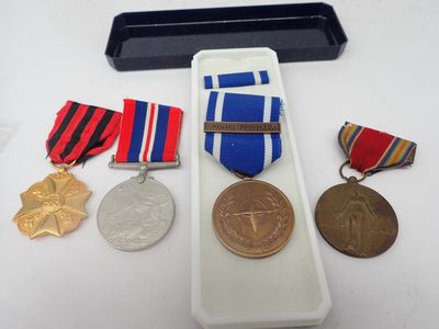 a small display case with medals and medals on it