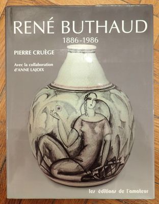 the cover of a book on a wooden table shows a vase with a painting on it