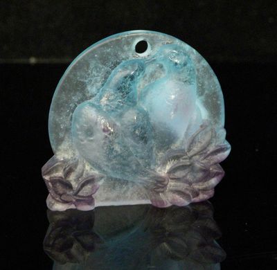 a picture of a blue and purple glass object