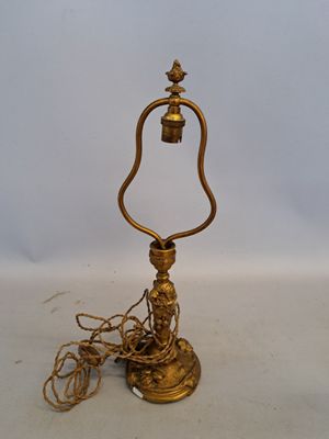 brass plated table lamp with a rope wrapped around the base