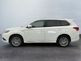 the white 2018 toyota highland is parked in a parking lot