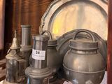 many different types of metal items on display in this room