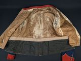 an old jacket that has been worn by a man