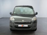 grey citroen van parked in a showroom with a black floor