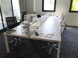 an image of a conference room with a table and chairs