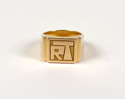 an image of a gold ring with the letter a on it