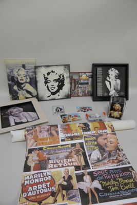 a table with many magazines and pictures on it