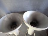 two speakers that are sitting on a table