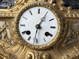a clock that is sitting on top of a table
