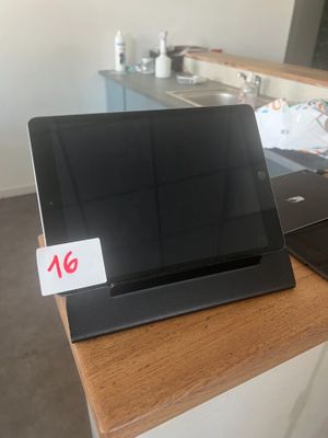 two laptops that are sitting on a table