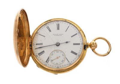 an image of a gold pocket watch with roman numerals on the dial