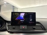 a picture of a car dashboard with a monitor on it