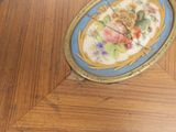 a picture of a picture of a clock on a table