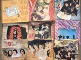 many different pictures of the beatles album covers on the floor