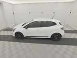 a picture of a white car parked in a garage