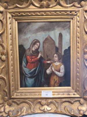 une image représentant un tableau où figure une femme avec un enfant