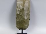 an image of a piece of rock that is on a stand