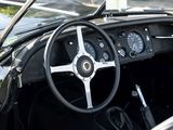 a steering wheel and dashboard of a classic car