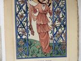 un vieux livre sur lequel figure l'image d'une femme tenant une fleur