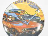 a clock that has a picture of a car and a dog on it
