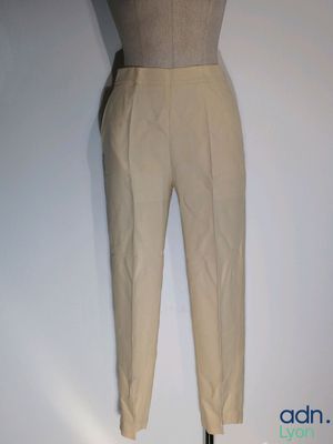 a mannequin mannequin wearing beige pants on a mannequin mannequin mannequin mannequin mannequin mannequin manne