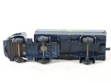 a toy train that is sitting on a white surface