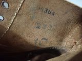 a close up view of a shoe with writing on it