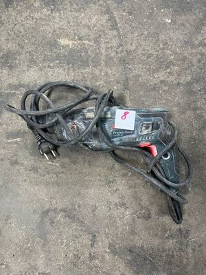 a cord cord and a cord cutter on the ground