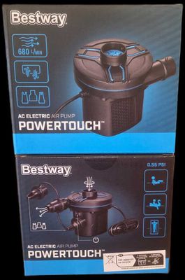 two boxes of powertouch water pumps on a black background
