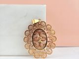 vintage gold filigree brooch pin with filigree flower design