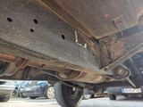 a close up of a car that is parked on the street
