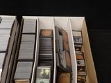 a lot of cards in a box on the table