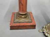 a wooden base with a metal base and a wooden base with a metal base and a wooden base with a metal base and a wooden base with a metal