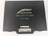 a black box with a logo on it on a white surface