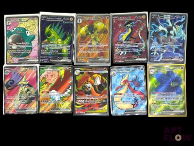 a lot of pokemon cards that are on the table