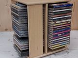 a stack of cds sitting on top of a table