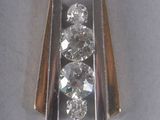 a picture of a pendant with three diamonds on it