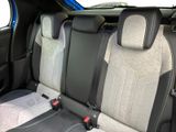 two seats in the back of a small car
