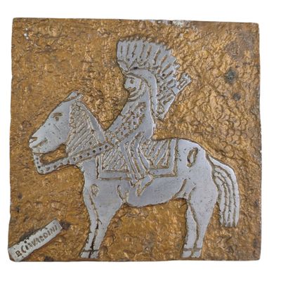 an image of a decorative tile depicting a man on a horse